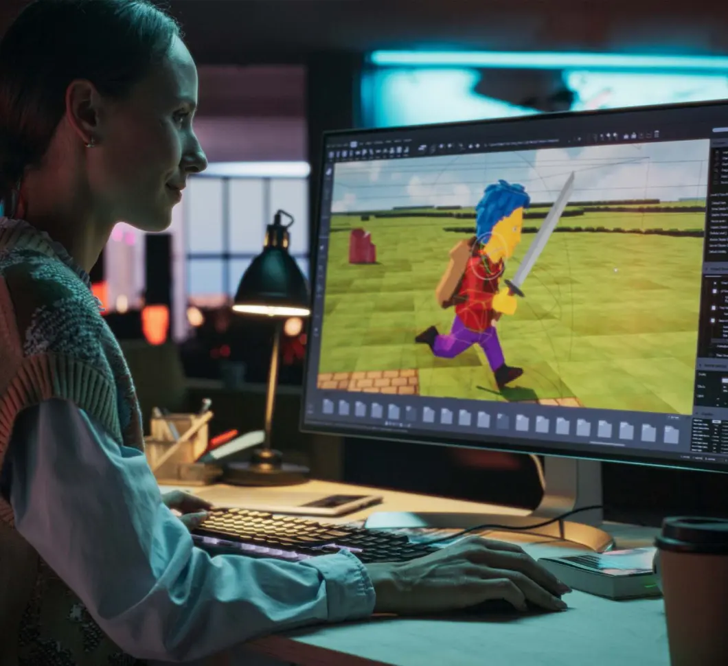 Game artist reviewing character art in a game development editor