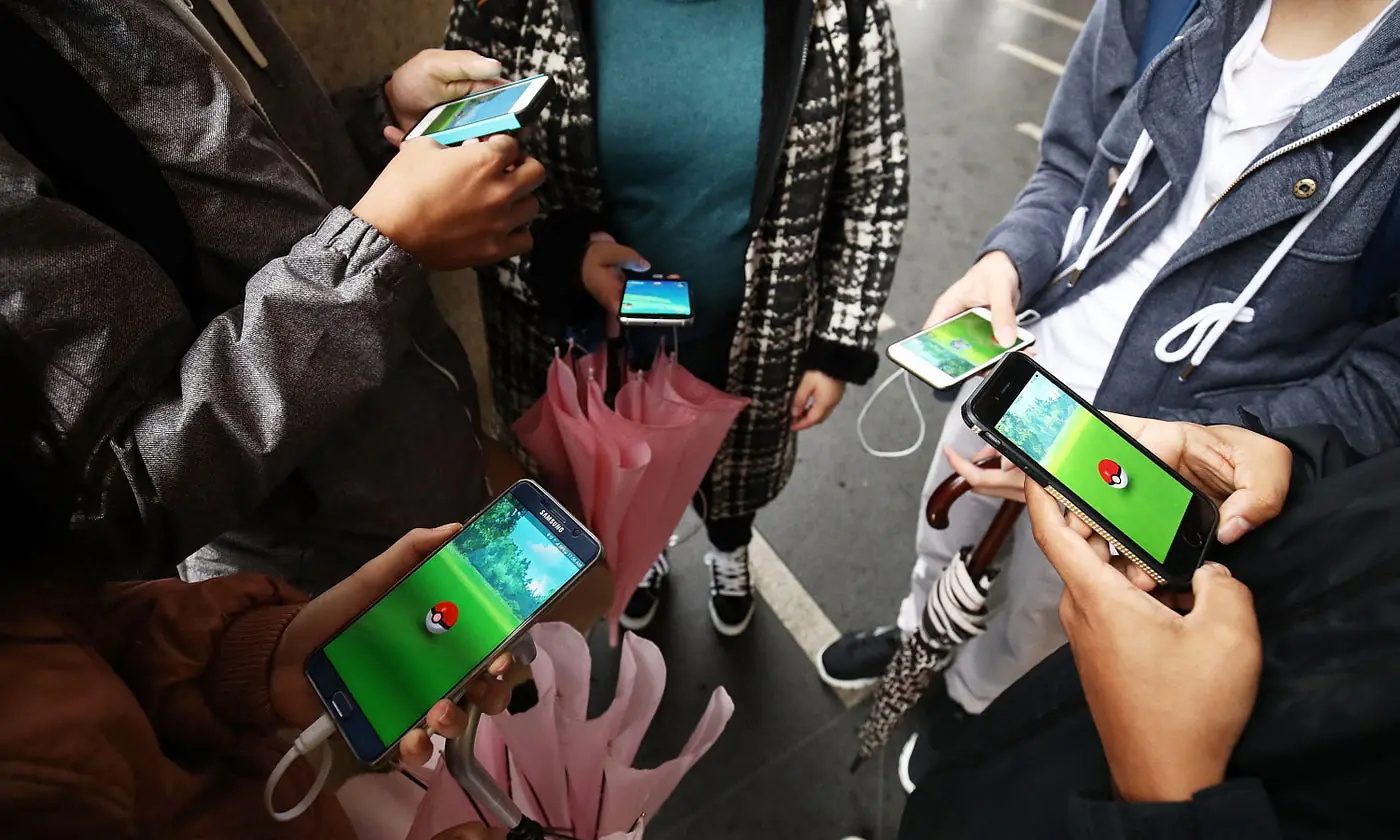 People playing Pokemon Go AR game